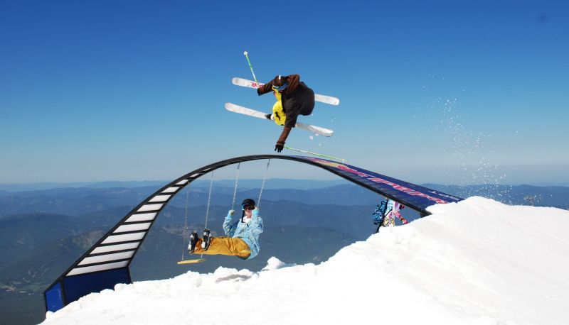 00038 timtalk alaskan camper rachel boisen swings as half-handdrag over the redbull rainbow.jpg