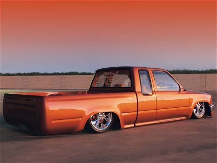 0610mt_01_z+custom_1990_toyota_hilux+drivers_side_view.jpg