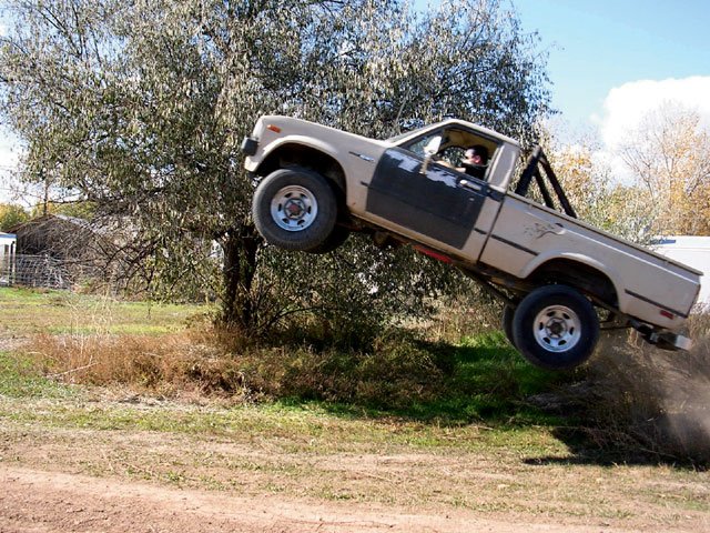 129_0708_04_z+1983_toyota_truck+jump.jpg