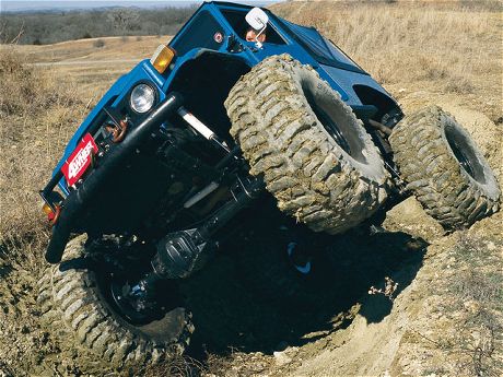 130_0307_01_z+1976_toyota_land_cruiser+offroading_)driver_side_front_view.jpg