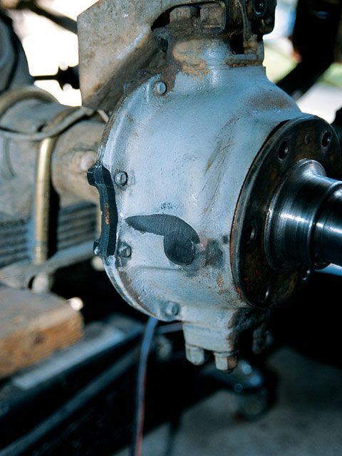 154_0704_03_z+early_jeep_disk_brake_conversion+clearance_grind.jpg