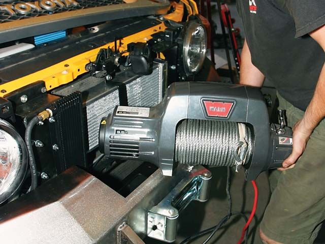 8-131_0611_14_z+2007_toyota_fj_cruiser_supercharger_install+warn_winch.jpg