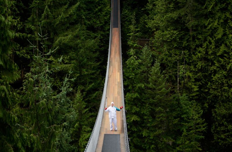 G 00137 the Capilano Suspension Bridge, poses after earlier in British Columbia CANADA.jpg